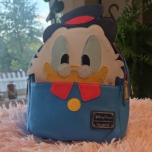 Loungefly Blue and Yellow Character Backpack